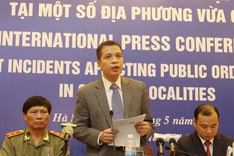 Assistant to the Foreign Minister Dang Minh Khoi addressing the press conference (Photo: VNA)